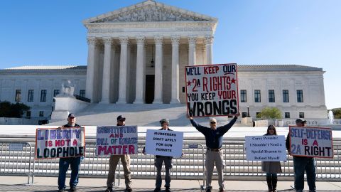 Demonstrators rally outside the U.S. Supreme Court in Washington, Wednesday, Nov. 3, 2021. 