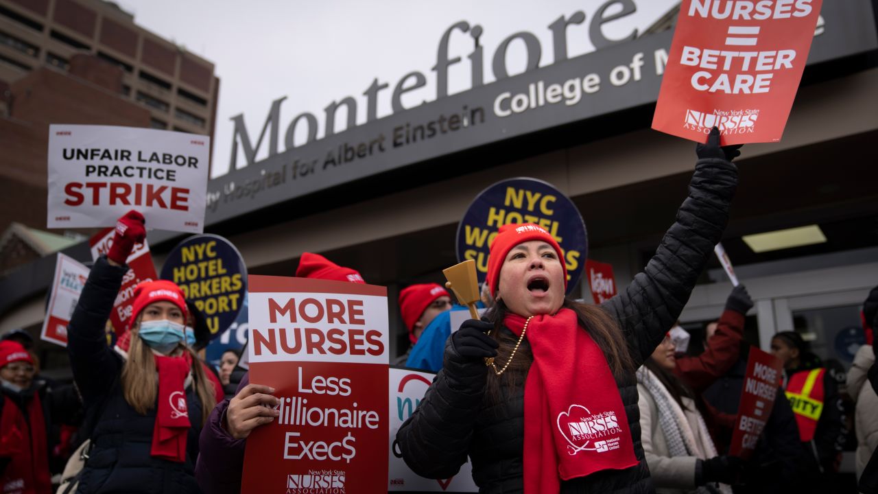 Protestors march on the streets around Montefiore Medical Center during a nursing strike, Wednesday, Jan. 11, 2023, in the Bronx borough of New York.