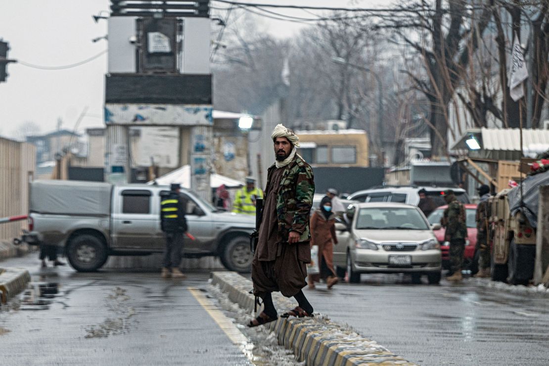 A Taliban security guard on a blocked road after a blast near Afghanistan's Foreign Ministry at Zanbaq Square in Kabul on January 11.