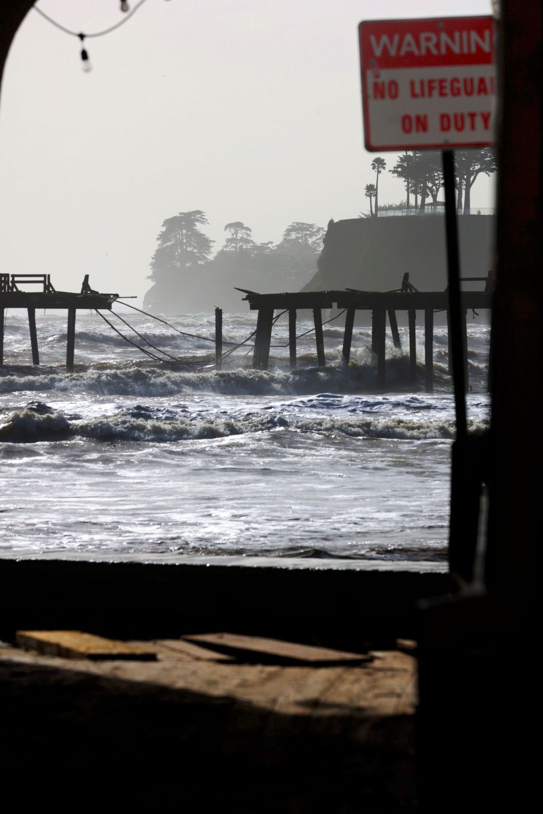 Waves in Monterey Bay battered the storm-damaged Capitola Wharf on Tuesday.
