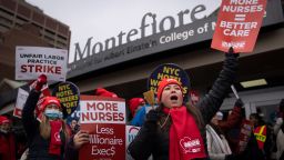 Protestors march on the streets around Montefiore Medical Center during a nursing strike, Wednesday, Jan. 11, 2023, in the Bronx borough of New York. 
