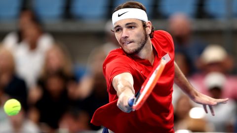 Fritz attempts a backhand against Italy's Matteo Berrettini in the United Cup final.