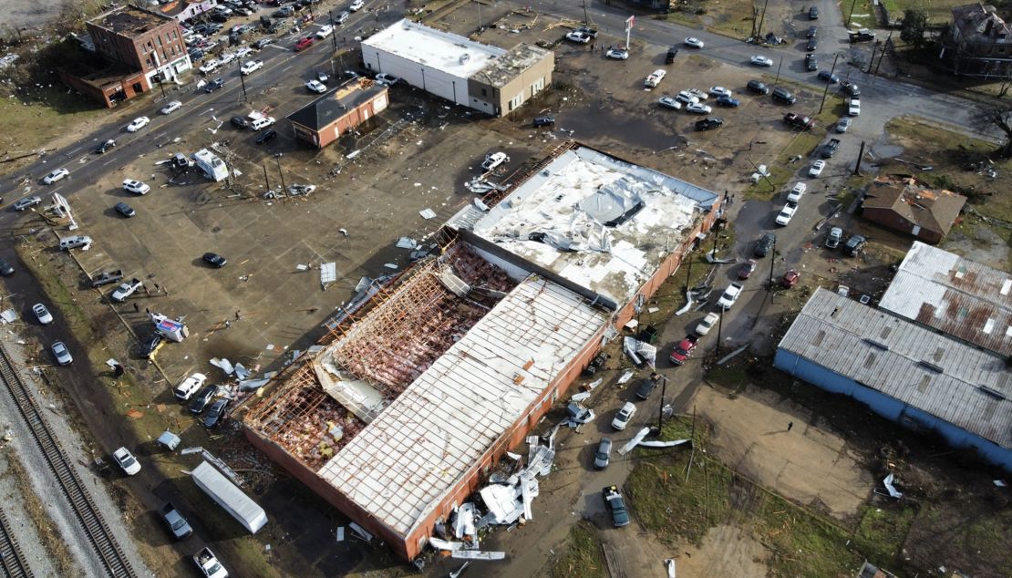 An aerial photo shows storm damage in the downtown area of Selma, by the railroad tracks crossing Broad Street.