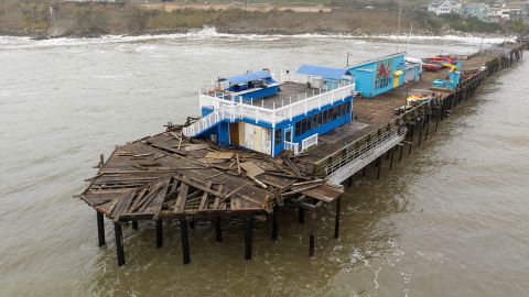 An aerial view shows damage to the pier on which the Wharf House restaurant is located.