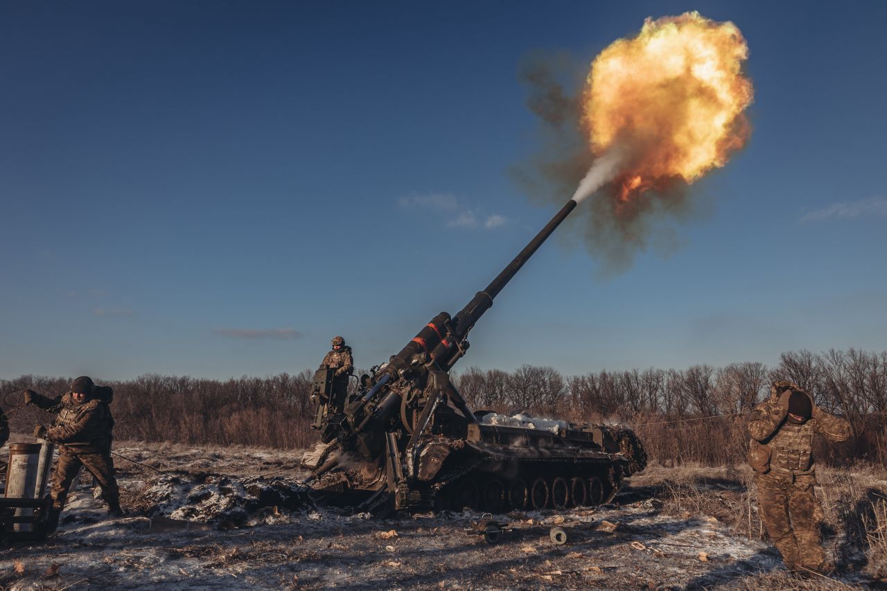 Ukrainian soldiers fire artillery while battling Russian forces in Donetsk, Ukraine, on Saturday, January 7. Russia invaded Ukraine in February.