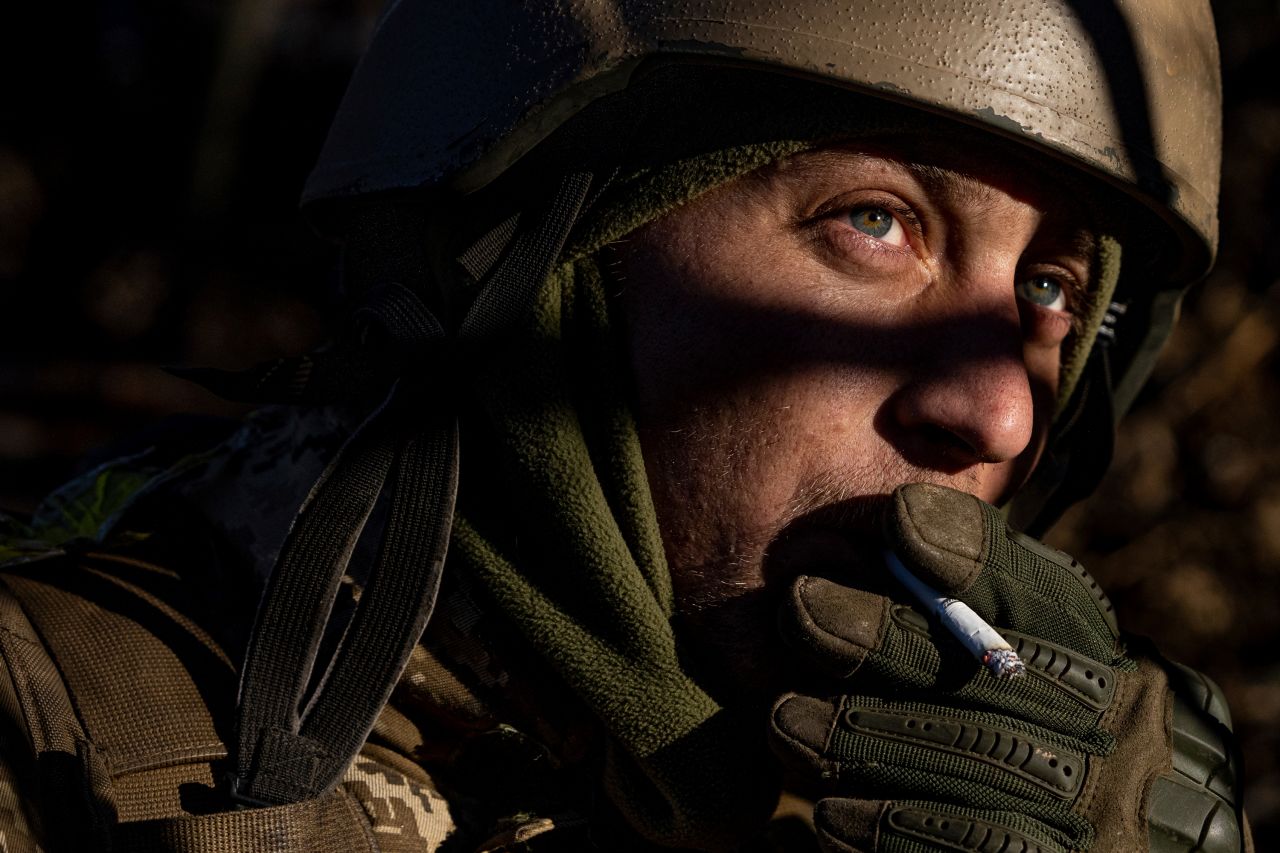 A Ukrainian serviceman smokes a cigarette on the front lines near Bakhmut, Ukraine, on Wednesday, January 11.