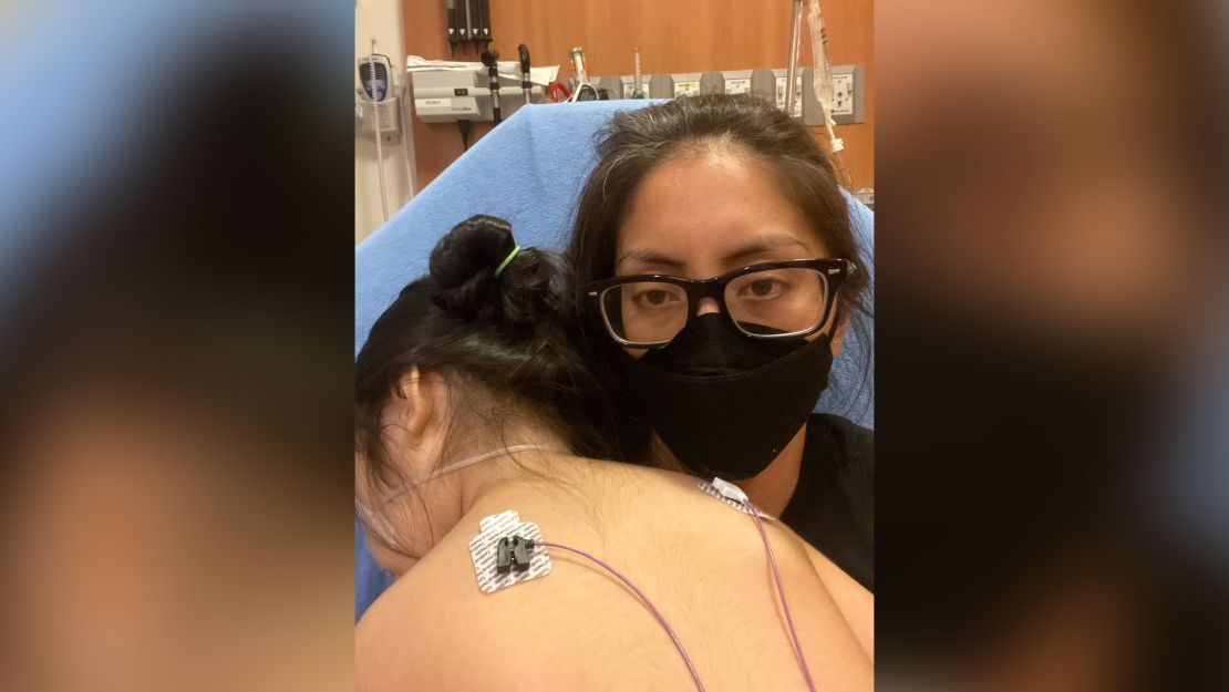 Stephanie Archinas-Murphin and her daughter, Margot, wait in the ER for the third time. This time, Margot was hospitalized.