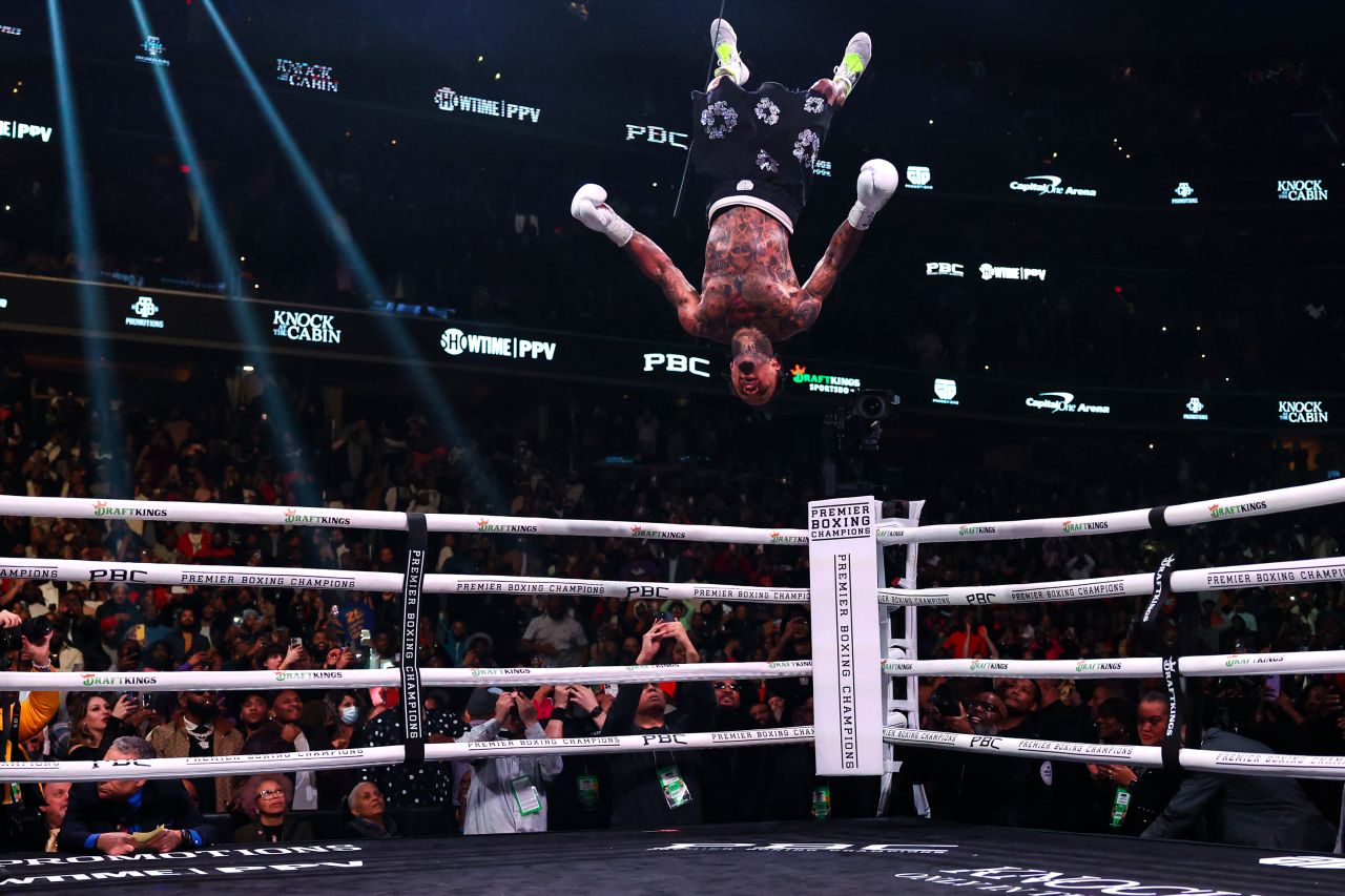Boxer Gervonta Davis does a backflip off the top rope after defeating Hector Luis Garcia in a WBA lightweight title bout on Saturday, January 7.