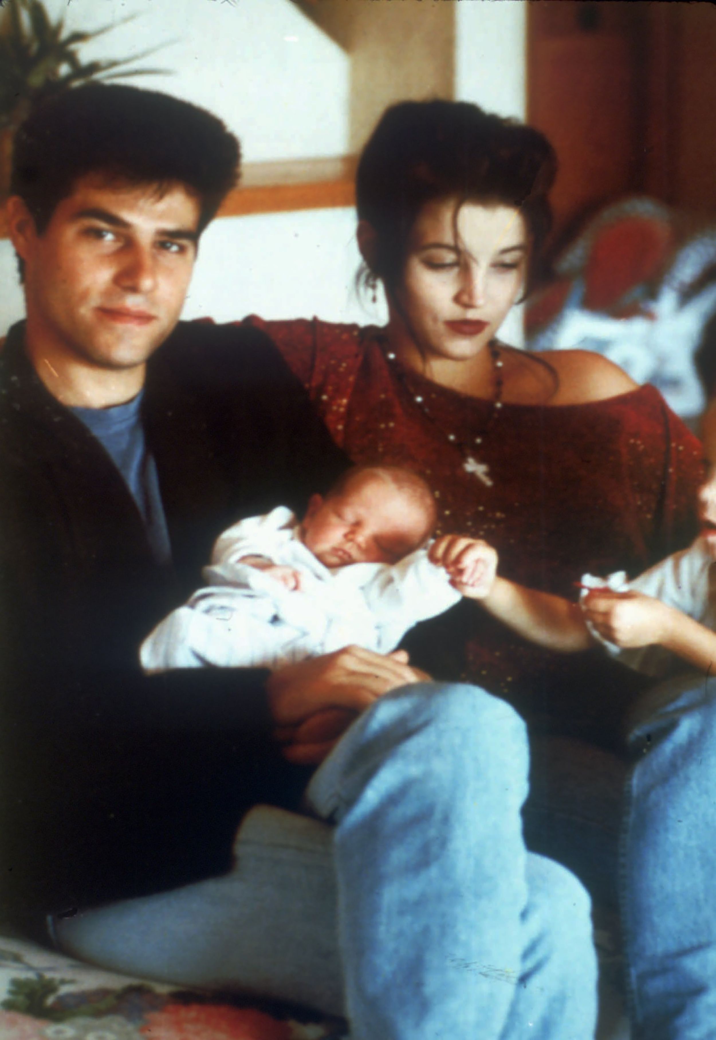 Presley and her first husband, musician Danny Keough, are seen in 1992 with their second child, Benjamin, and their daughter, Riley Keough.