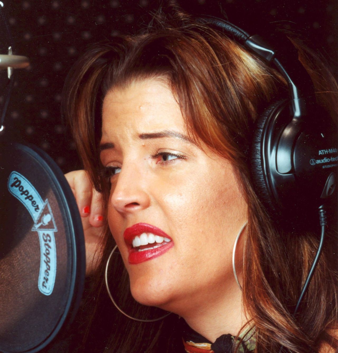 Presley works in the studio in 2000 on her debut album, "To Whom It May Concern," which reached No. 5 on the Billboard 200 albums chart and was certified gold.