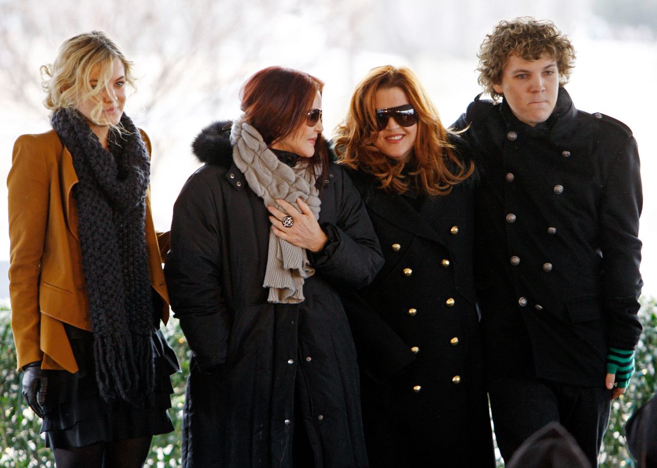 From left, Riley Keough, Priscilla Presley, Lisa Marie Presley and Benjamin Keough take part in a ceremony commemorating Elvis' 75th birthday in 2010.