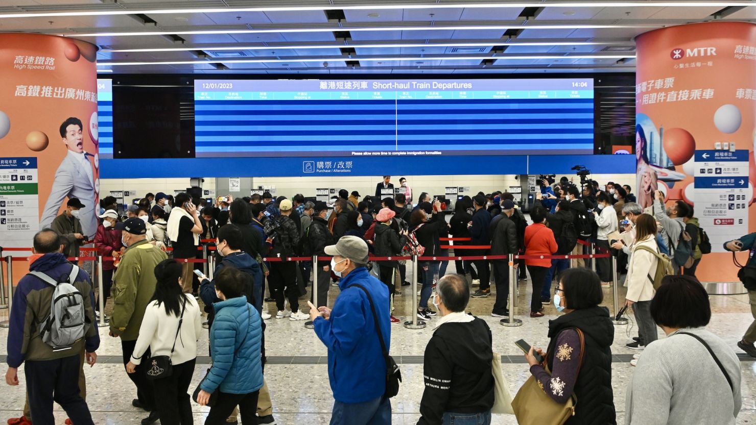 People line up to buy tickets at Hong Kong's West Kowloon Station on January 12, ahead of the resumption of the high-speed rail link.