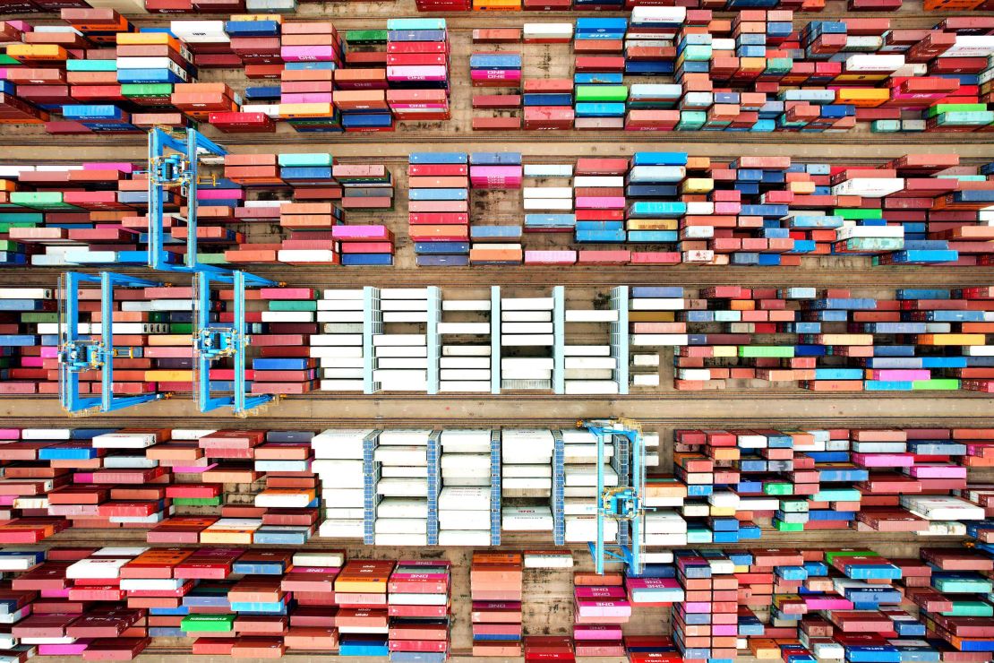 This aerial photo shows cargo containers stacked at a port in Qingdao, in China's eastern Shandong province, on June 9, 2022. 