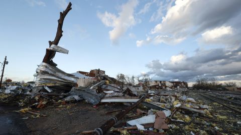 Damage from businesses hit by a tornado that went through downtown Selma, Alabama, is scattered on the ground Thursday.