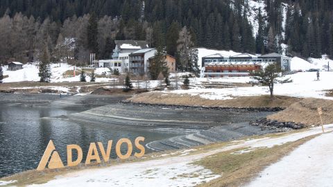 A wooden sign on the waterfront of Lake Davos in Davos, Switzerland, on Jan. 8, 2023. 