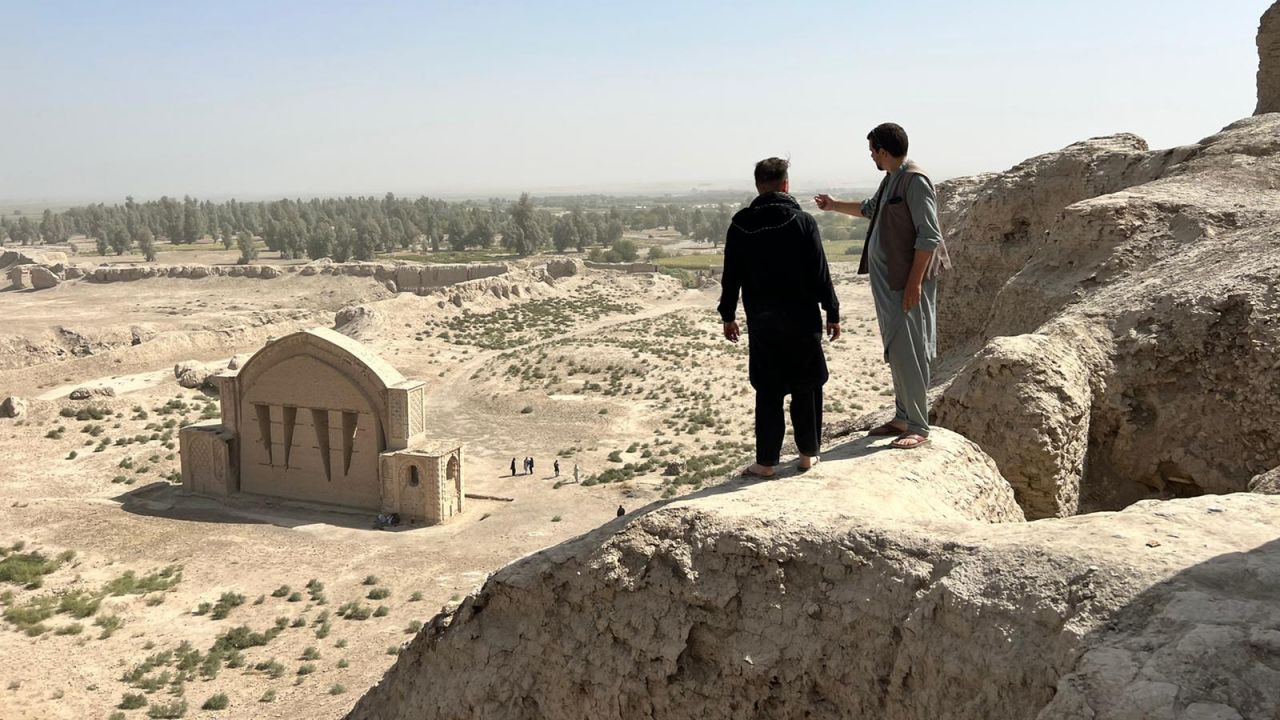 <strong>Guiding the way: </strong>Tour guide James Willcox and one of his clients in Qala e Bost, Helmand province.