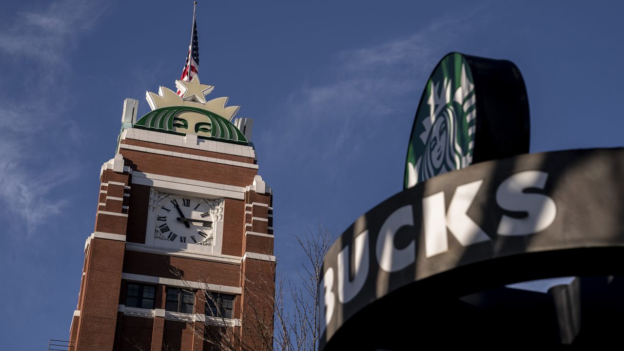 A logo on the clock tower of the Starbucks Corp. headquarters in Seattle, Washington, US, on Wednesday, Jan. 11, 2023. 