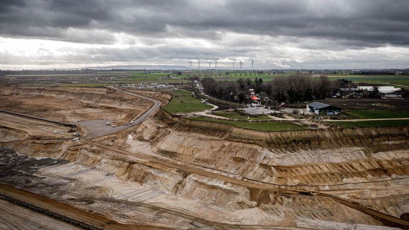 Germany plans to destroy this village for a coal mine.  Thousands gather to stop him