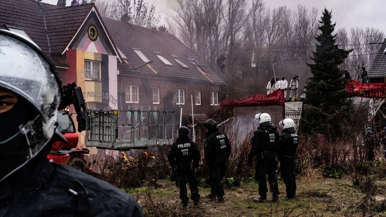 Police prepare to enter buildings to remove activists in the condemned village of Lützerath on Thursday, January 12.