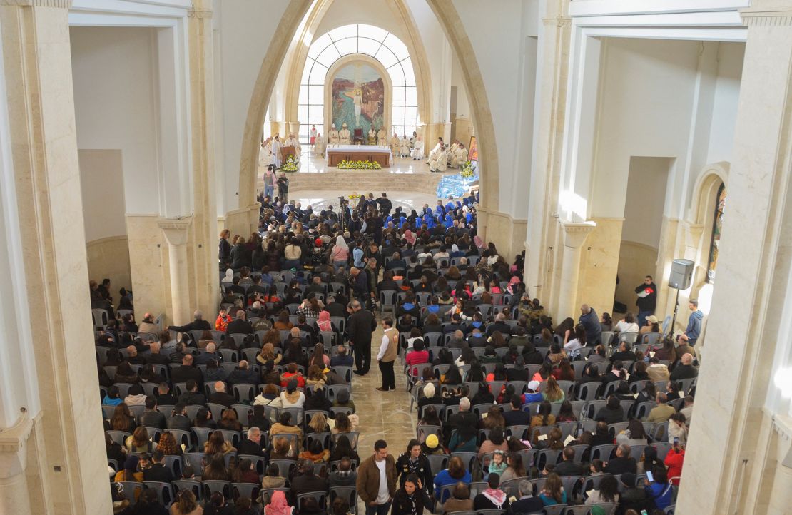 Worshipers attend a mass inside the Church of the Baptism of Lord Jesus Christ in Jordan Valley, Jordan, during an annual Christian pilgrimage on January 13.