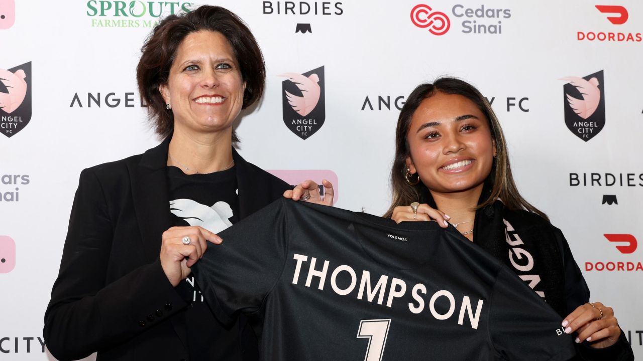 PLAYA VISTA, CALIFORNIA - JANUARY 12: Angel City Football Club President Julie Uhrman and first overall draft pick Alyssa Thompson pose with a jersey during the Angel City Football Club 2023 NWSL Draft Party at Nike LA on January 12, 2023 in Playa Vista, California. (Photo by Katelyn Mulcahy/Getty Images)