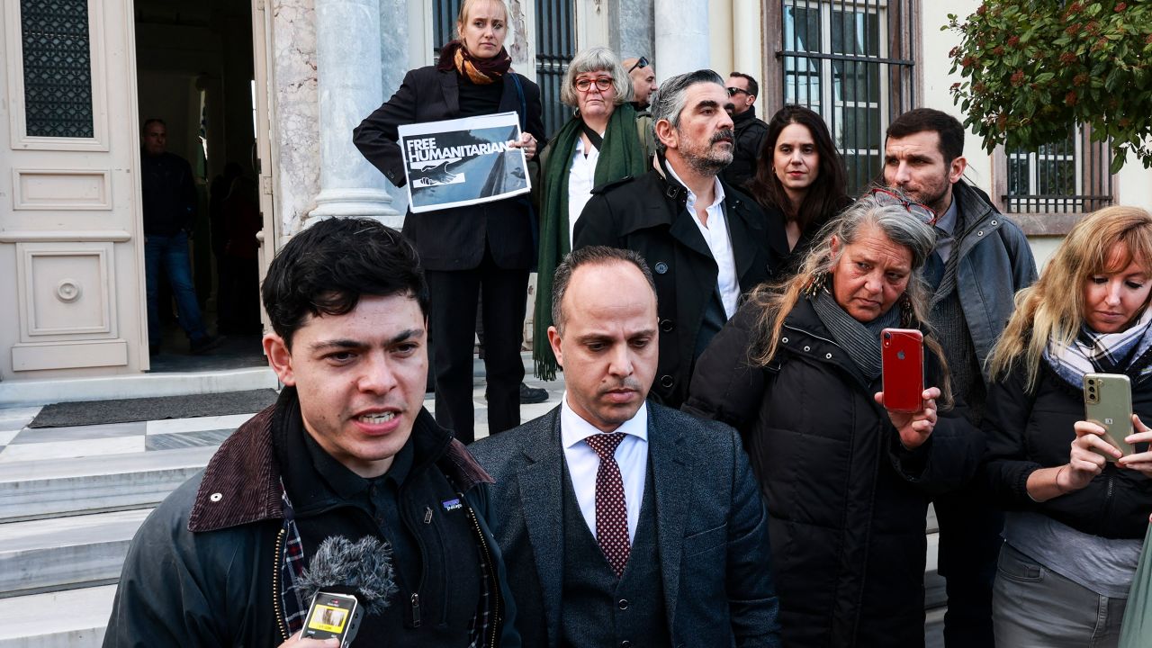 Rescue worker Sean Binder talks to the media outside a court in Mytilene on January 13.