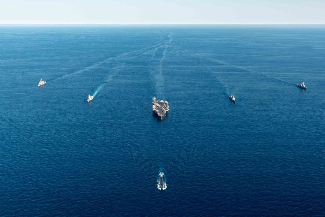 Japanese and South Korean warships join the submarine USS Annapolis and ​US nuclear-powered aircraft carrier Ronald Reagan during a combined trilateral anti-submarine exercise on September 30, 2022.