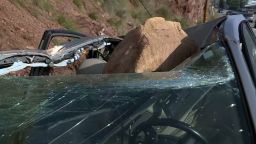 Mauricio Henao's car was crushed by a boulder on Tuesday in Malibu, California.