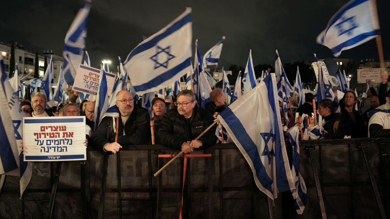 Israelis protest against the government's plans to overhaul the country's legal system in Tel Aviv on Saturday. 