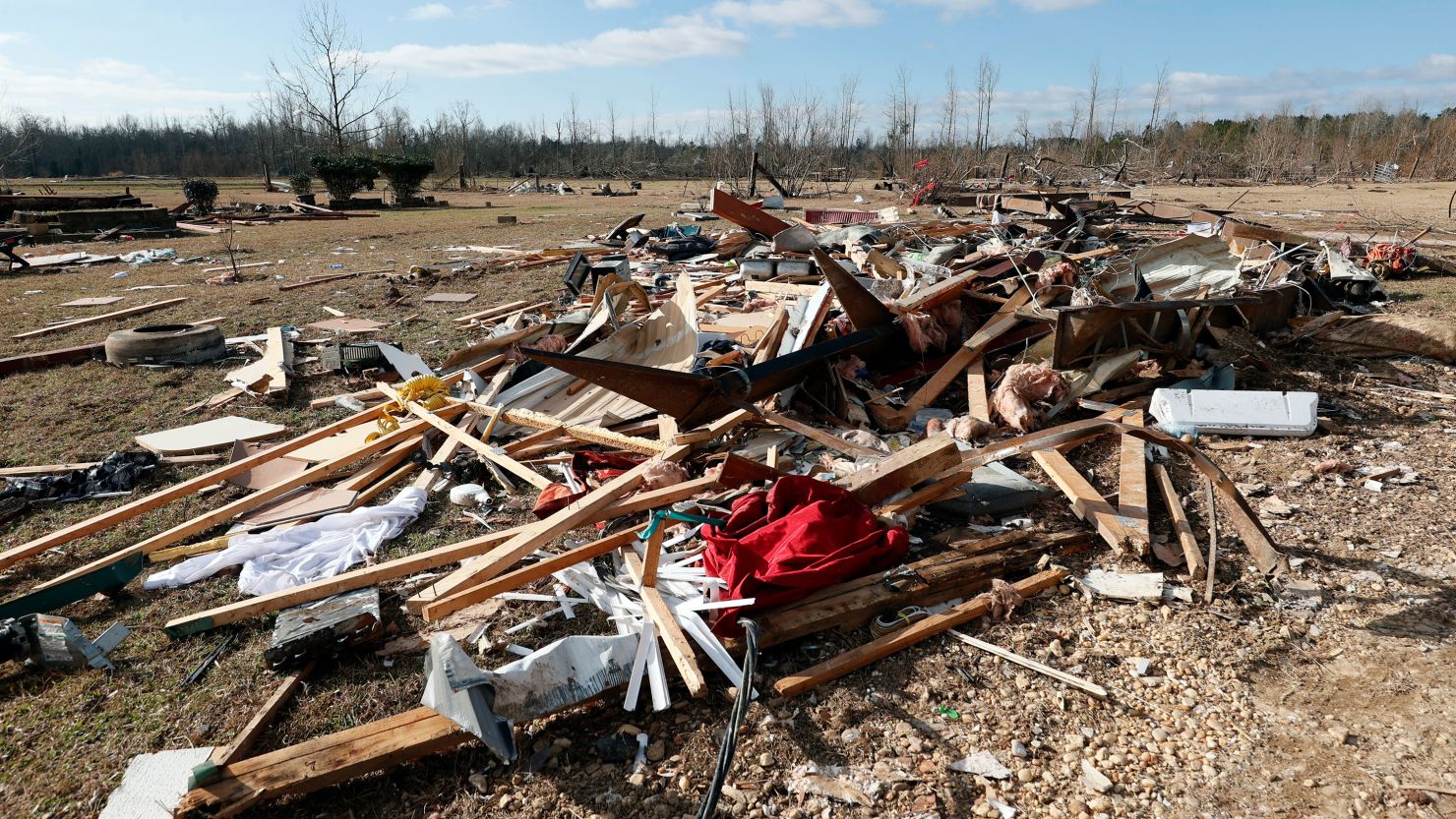 Debris from a tornado that ripped through Central Alabama last week is seen along County Road 140 on Saturday, January 14, in Autauga County, Alabama.