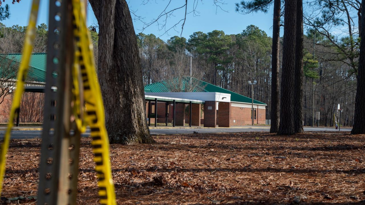 NEWPORT NEWS, VA - JANUARY 07: Police tape hangs from a sign post outside Richneck Elementary School following a shooting on January 7, 2023 in Newport News, Virginia. A 6-year-old student was taken into custody after reportedly shooting a teacher during an altercation in a classroom at Richneck Elementary School on Friday. The teacher, a woman in her 30s, suffered "life-threatening" injuries and remains in critical condition, according to police reports. (Photo by Jay Paul/Getty Images)