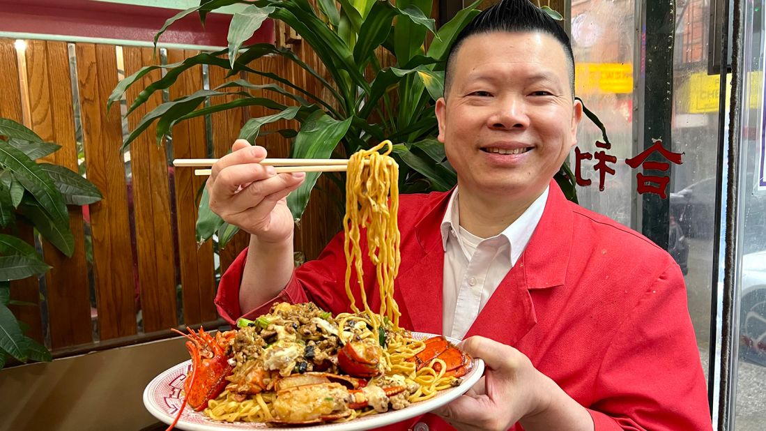 <strong>Lobster longevity noodles: </strong>New York City restaurant Hop Lee's longevity noodles feature yi mein and lobsters, which are stir-fried with fermented salted black beans, eggs, minced meats, ginger and scallions."It's so delicious," says owner Johnny Mui, pictured.
