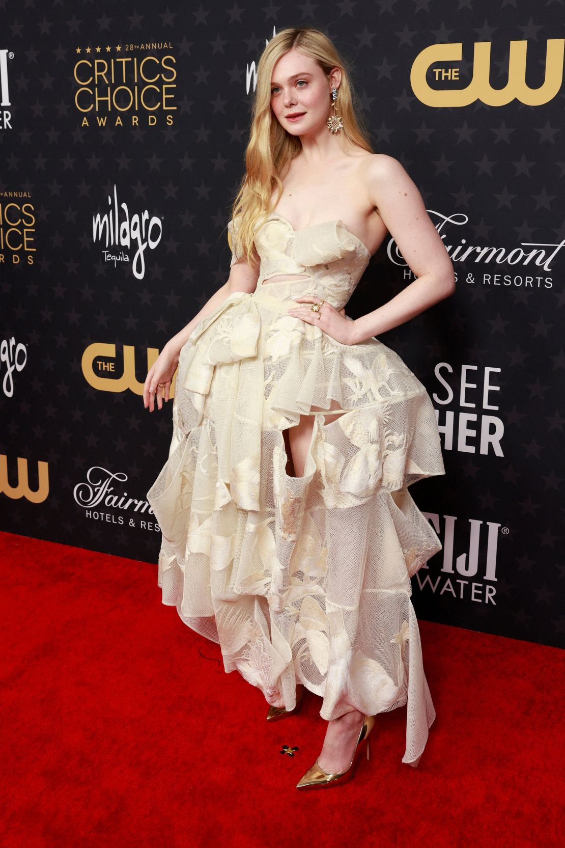 Elle Fanning in a cutout gown from Alexander McQueen's Spring-Summer 2023 collection. 