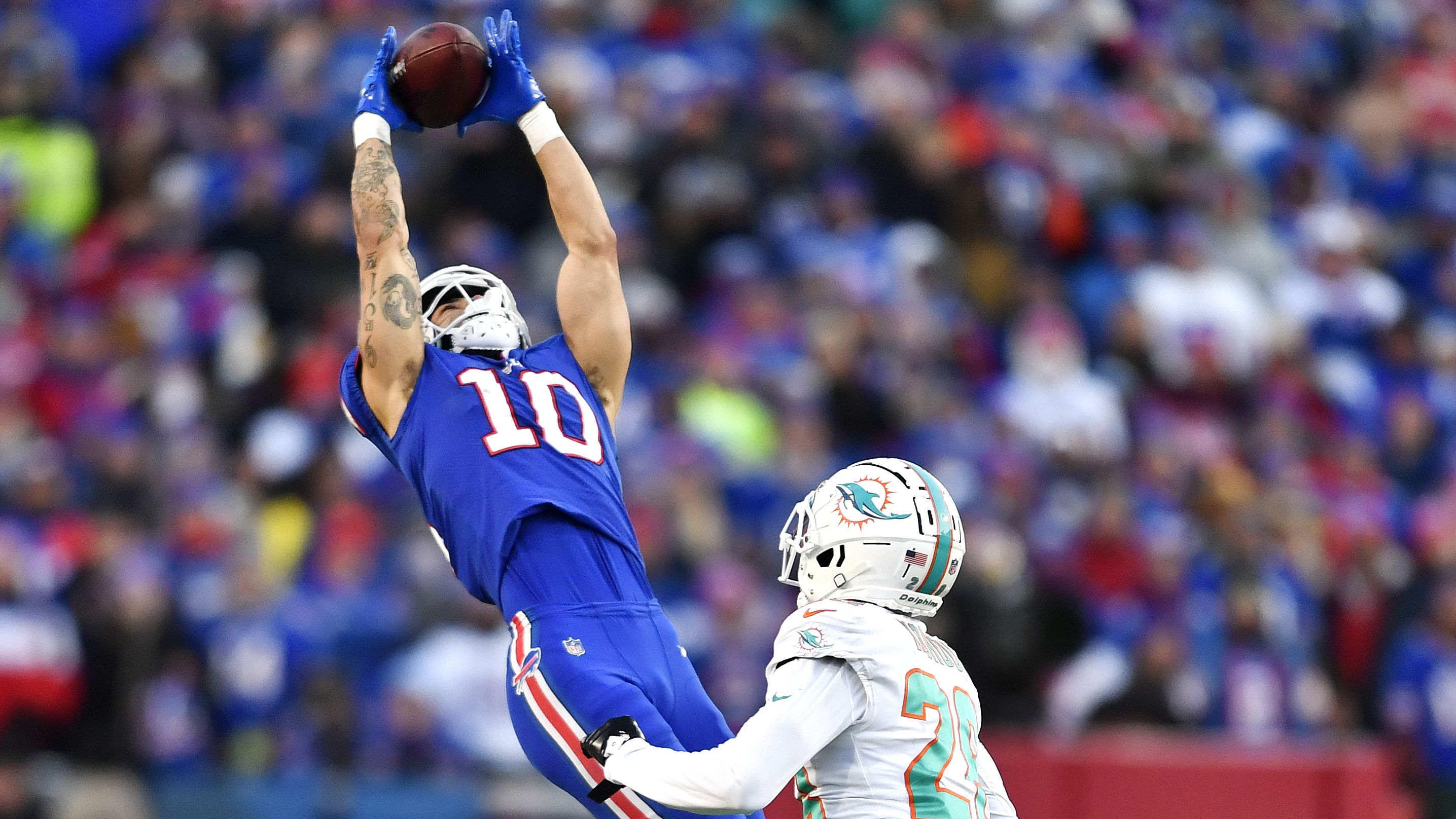 Buffalo Bills wide receiver Khalil Shakir grabs a pass against Miami Dolphins cornerback Kader Kohou. Despite playing with third-string quarterback Skylar Thompson, the Dolphins almost shocked the Bills but came up just short, turning the ball over on downs on Miami's final possession of the game as they lost 34-31. The Bills will now face the Bengals for the first time since Bills safety Damar Hamlin's on-field collapse brought a game between the two teams to a halt and set off a national outpouring of support.