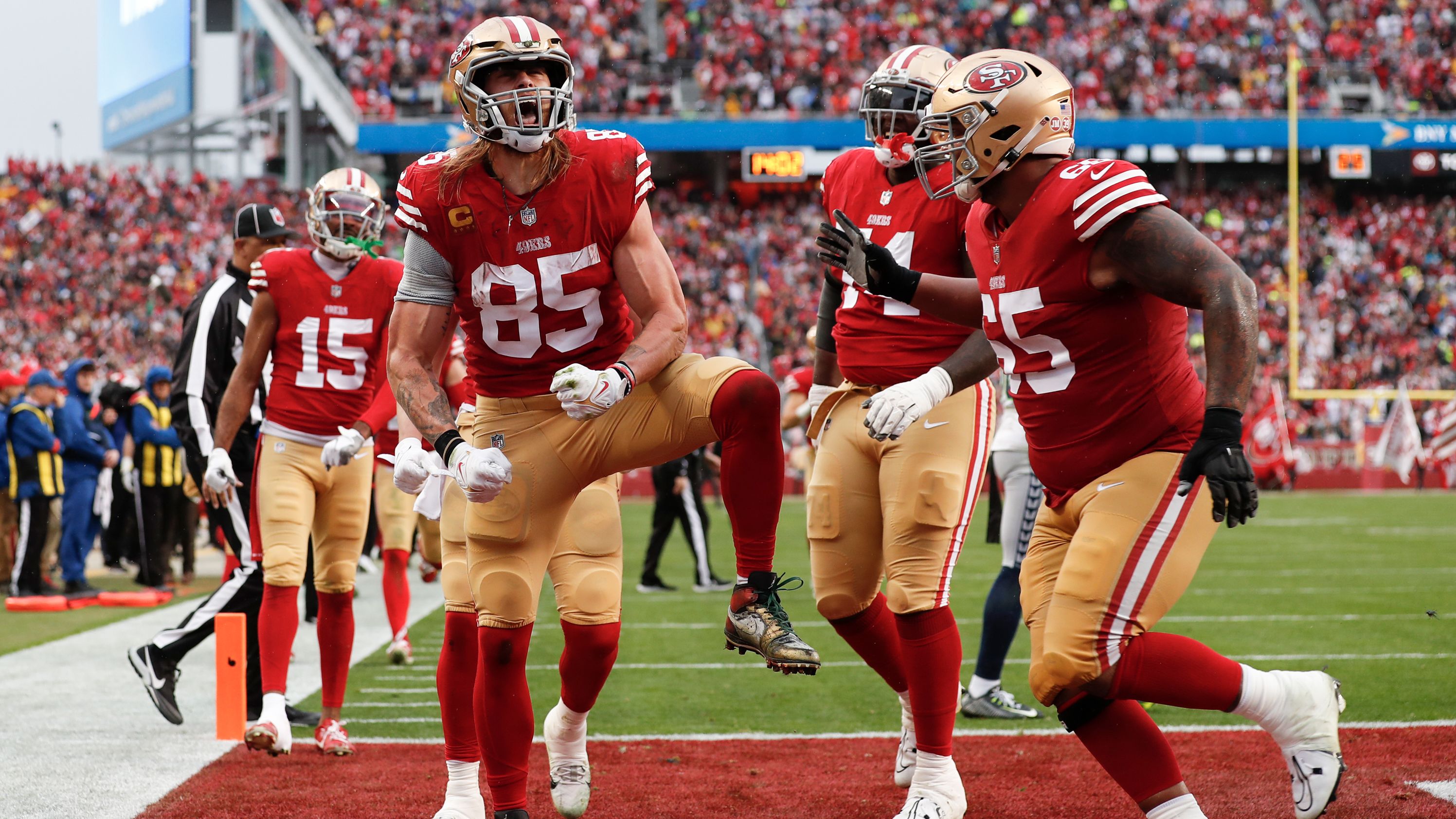 San Francisco 49ers tight end George Kittle celebrates after scoring a two-point conversion against the Seattle Seahawks. The 49ers used a big second half to break away from a plucky Seahawks squad and win 41-23. It continues the remarkable run of rookie 49ers quarterback Brock Purdy -- who threw for three touchdowns -- who was drafted with the final pick of last year's NFL draft. 