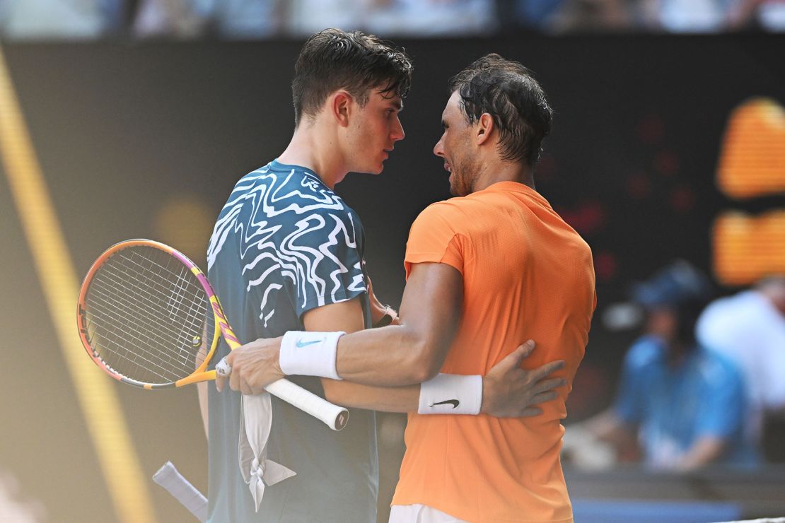 Nadal and Draper embrace at the net after the Spaniards victory. 