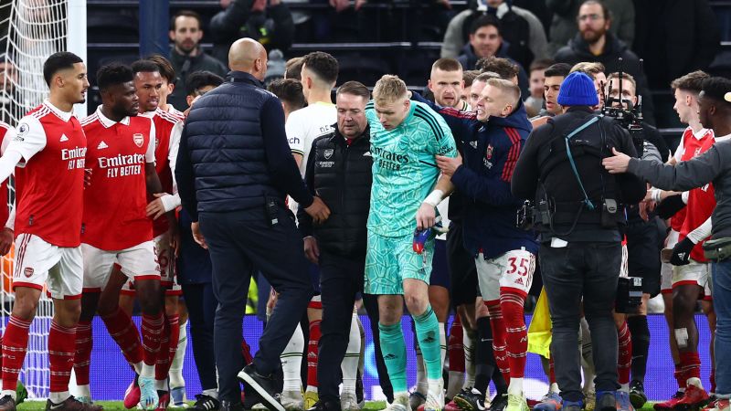 Arsenal goalkeeper Aaron Ramsdale appears to be kicked by