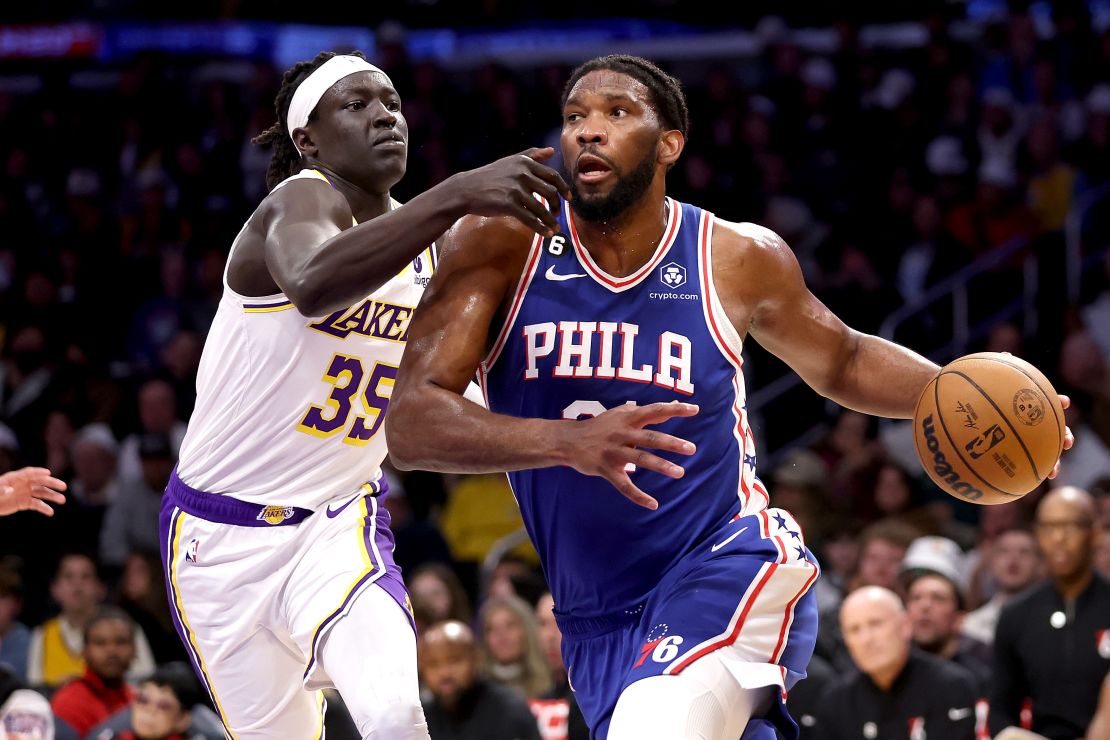 Embiid dribbles past Wenyen Gabriel in Sunday's game. 
