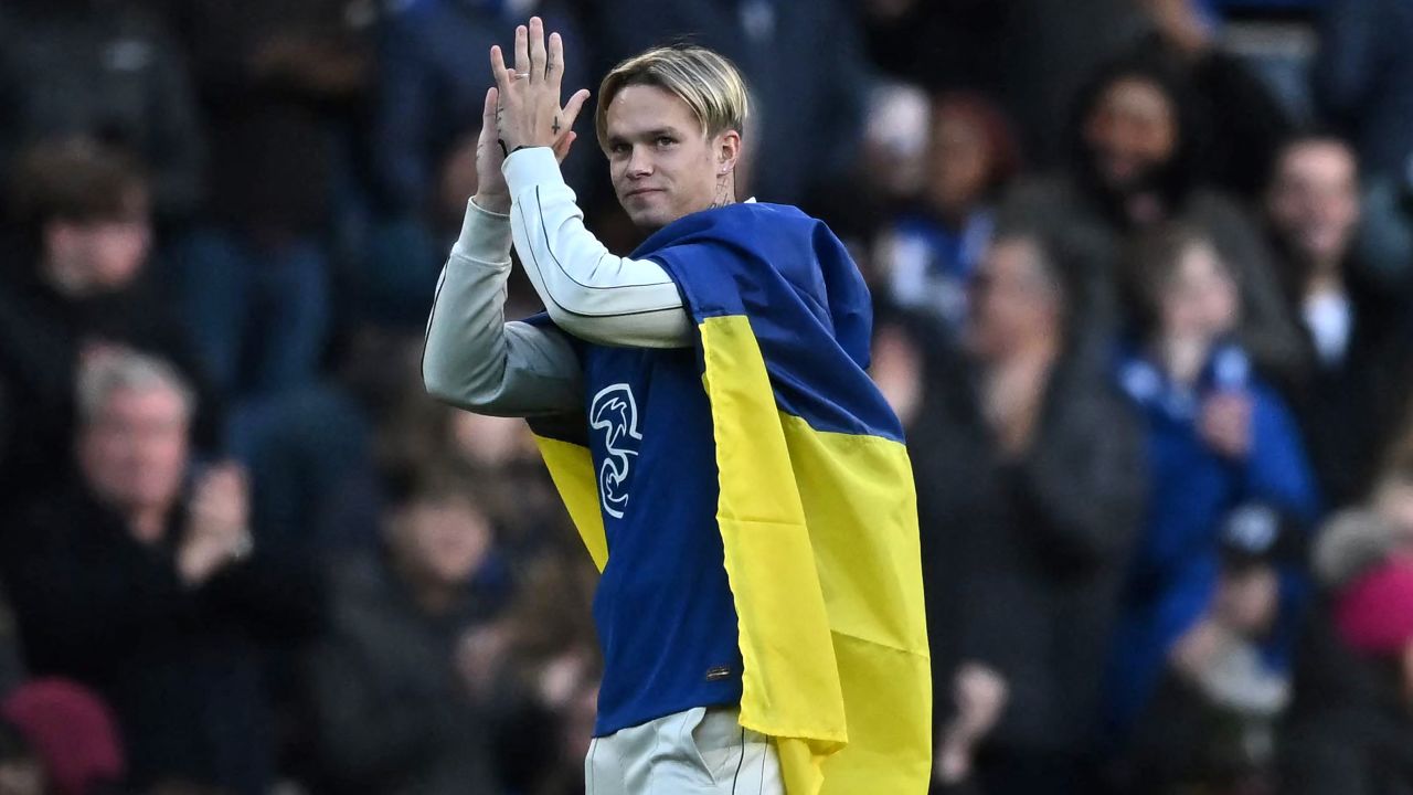 Mykhailo Mudryk, wrapped in an Ukrainian flag, was introduced as a Chelsea player on January 15.