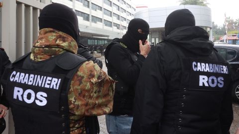 Police stand outside the hospital in Palermo, Sicily, where Italy's most wanted Mafia boss was arrested on January 16, 2023.