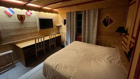 CNN Travel's binational room, where the bed is in both Switzerland and France. 