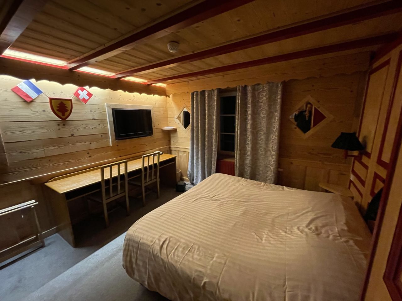 CNN Travel's binational room, where the bed is in both Switzerland and France. 