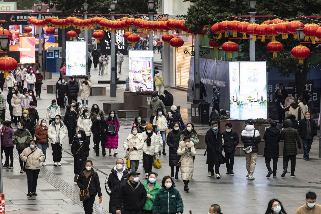 Pedestrians at the Chunxi Road shopping area in Chengdu, Sichuan province, China, on Saturday, January 14, 2023. 