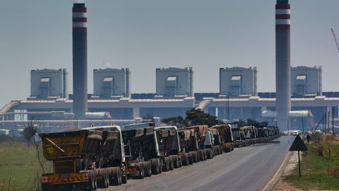 Coal delivery trucks queue outside the Kusile coal-fired power station in Mpumalanga, South Africa, on Friday, Oct.  15, 2021.