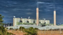 Vapour rises from chimneys at the Eskom Holdings SOC Ltd. Medupi coal-fired power station in Lephalale, South Africa, on Thursday, May 19, 2022. South Africas Eskom is increasing power cuts to prevent a total collapse of the grid as issues grow from lack of imports to breakdowns at its coal-fired plants. Photographer: Waldo Swiegers/Bloomberg via Getty Images