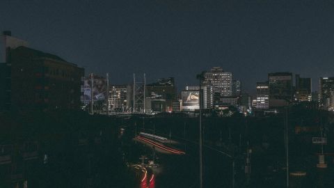 The darkened Braamfontein district in central Johannesburg during a load shed on January 15, 2023.