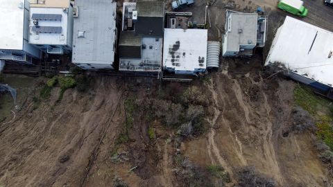 A view of a mudslide and damaged houses after flooding in Aptos, California, Monday.