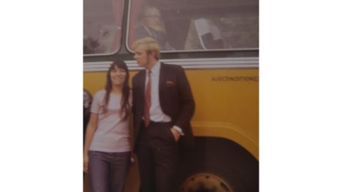 Here's Carolyn and Chris outside the bus.