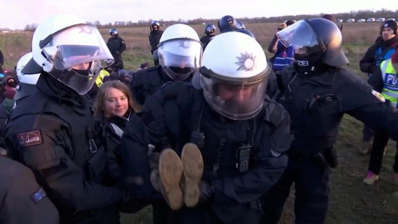 See climate activist Greta Thunberg being carried away by German police 