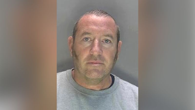 David Carrick UK police sack officer who admitted to 49 sex offenses photo